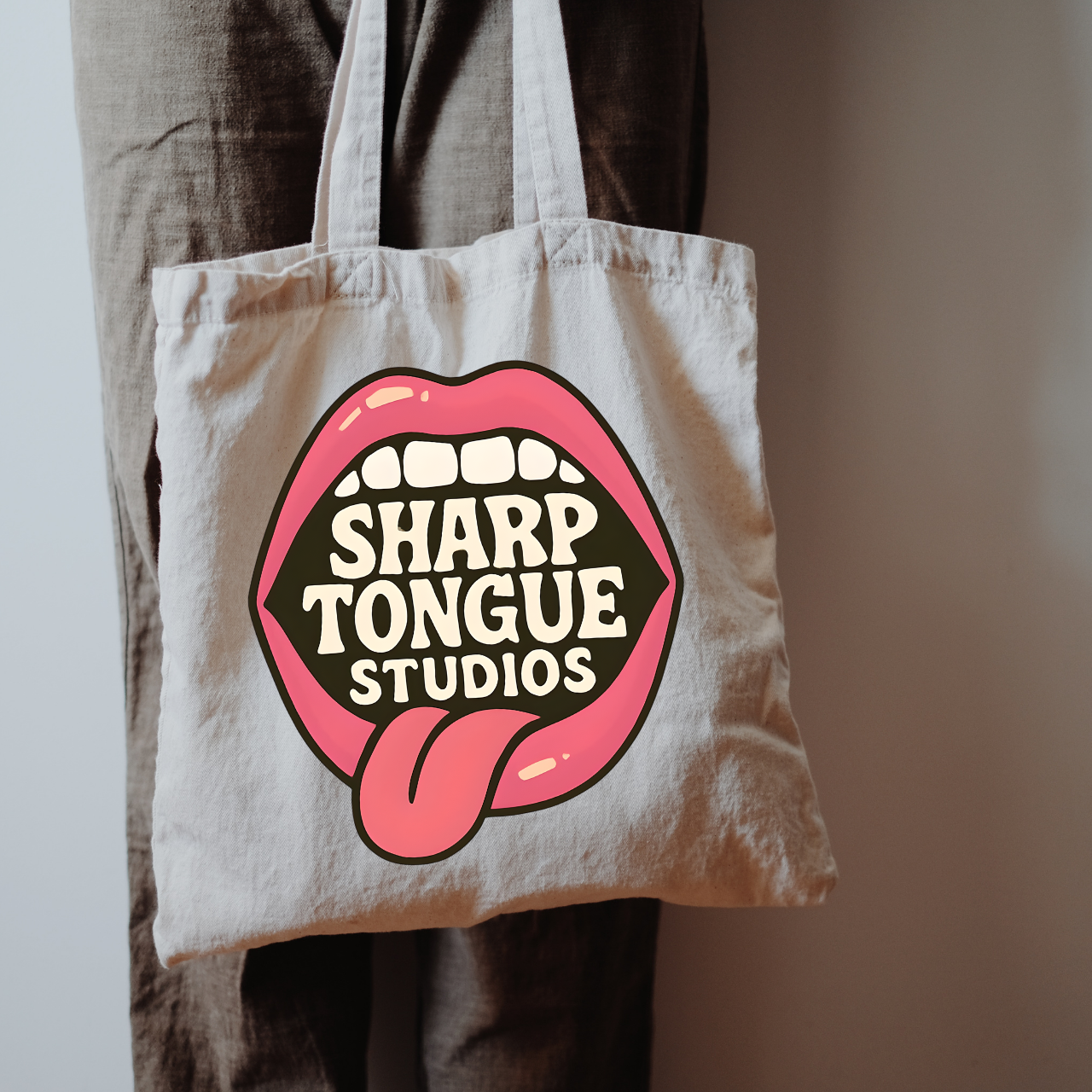 Copy of Not a Hugger Canvas Tote Bag By Sharp Tongue Studio product thumbnail image Copy of Not a Hugger Canvas Tote Bag By Sharp Tongue Studio product thumbnail image