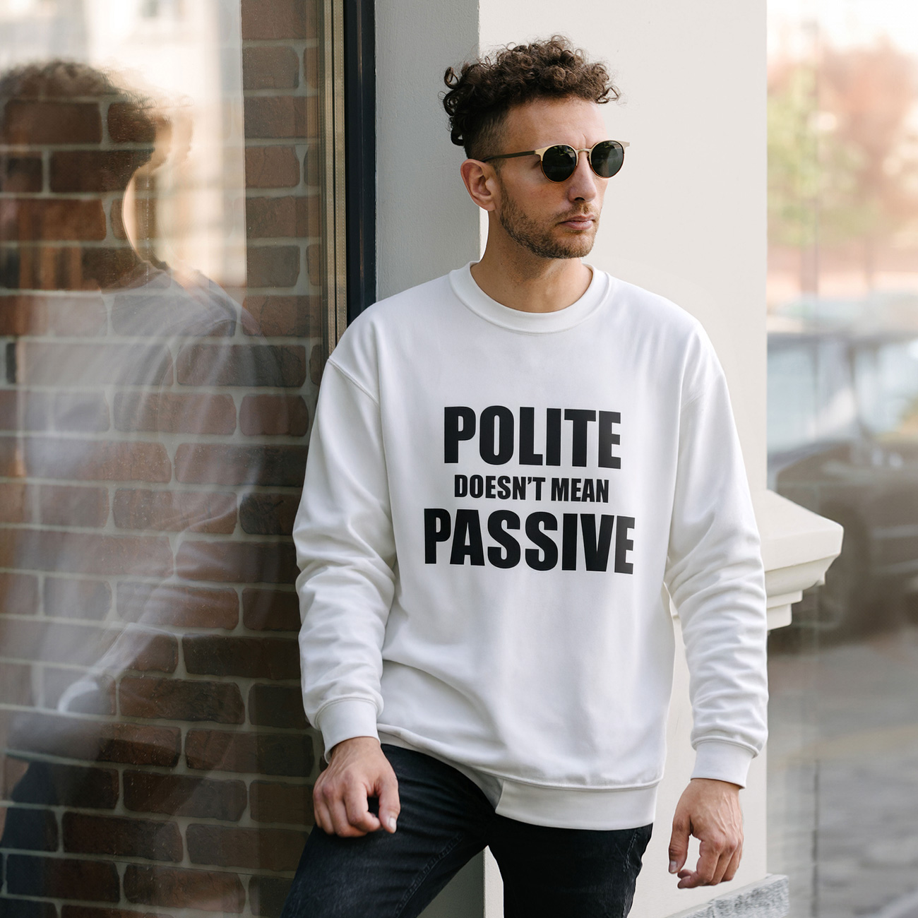 Polite Doesn’t Mean Passive Crewneck Sweatshirt — Bold Statement Pullover