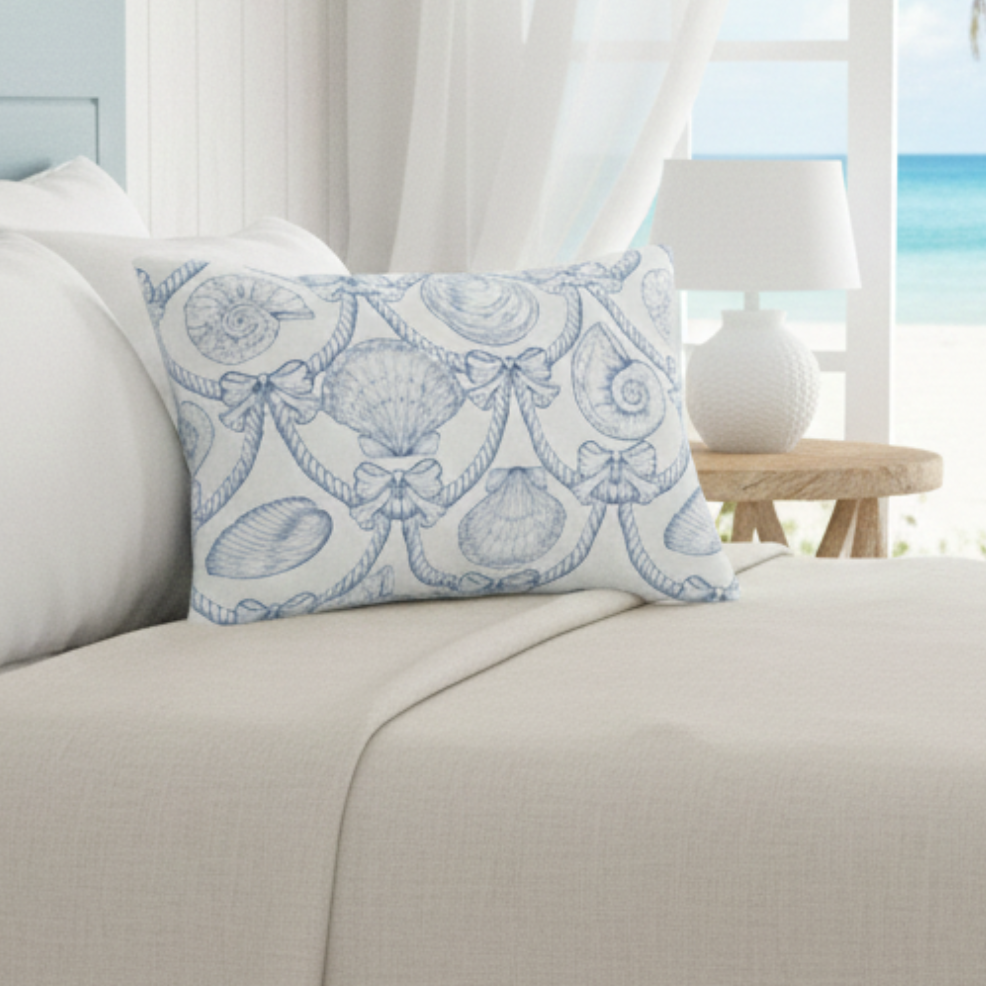 Coastal Seashell Lumbar Pillow | Blue Nautical Rope & Shell Accent Pillow | Beach House Coastal Decor | Ocean Inspired Throw Pillow product thumbnail image Coastal Seashell Lumbar Pillow | Blue Nautical Rope & Shell Accent Pillow | Beach House Coastal Decor | Ocean Inspired Throw Pillow product thumbnail image
