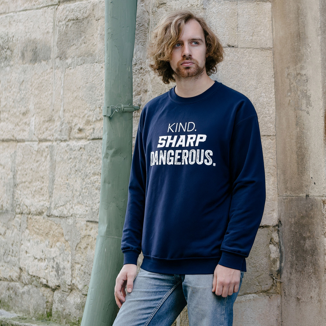 Crewneck Sweatshirt — "Kind. Sharp. Dangerous." Vintage Text Graphic