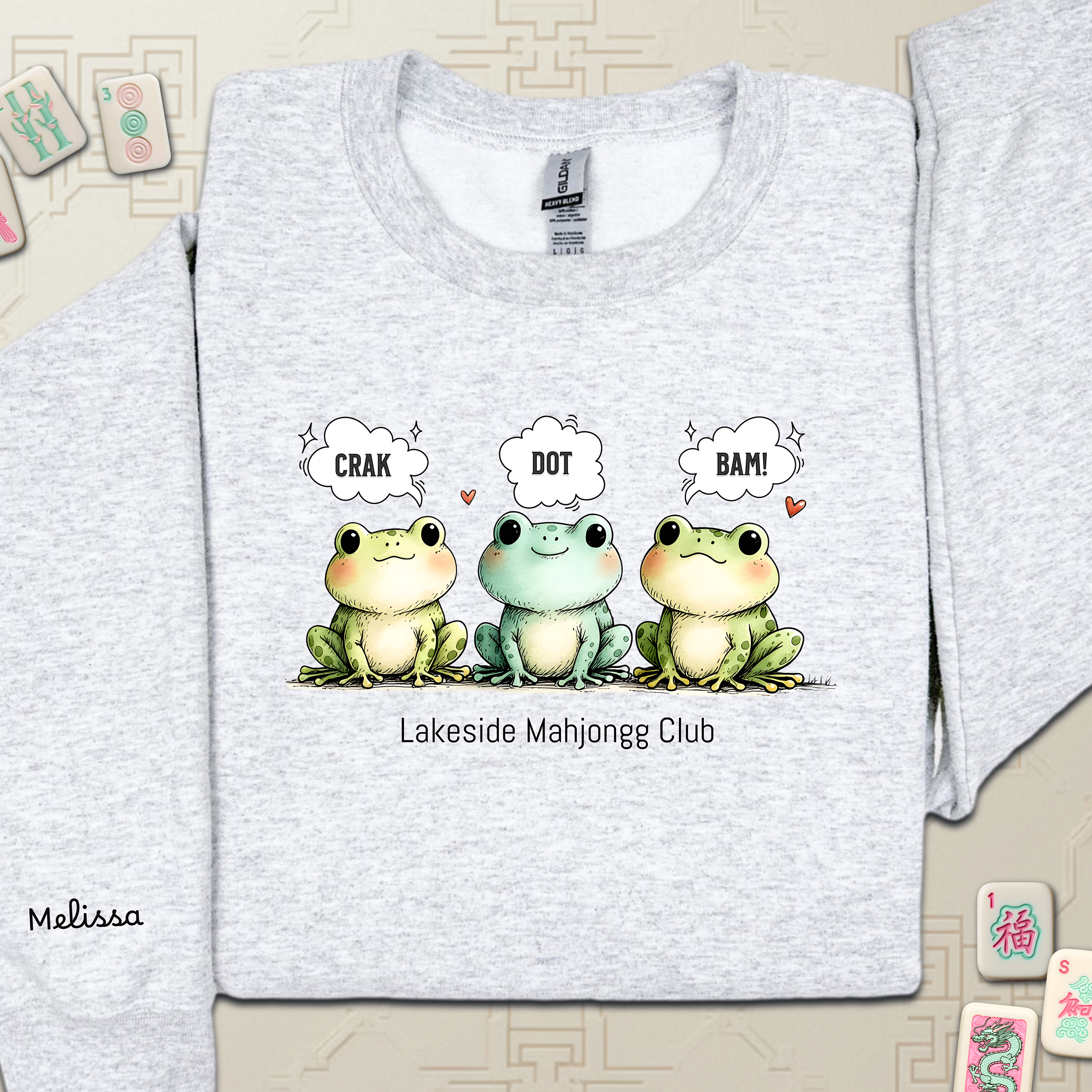 Froggy Crak Dot Bam Sweatshirt – Custom American Mahjong Club Pullover with Personalized Name on Chest and Sleeve, Unisex Heavy Blend™ Crewneck Gildan 18000Sweatshirt product thumbnail image Froggy Crak Dot Bam Sweatshirt – Custom American Mahjong Club Pullover with Personalized Name on Chest and Sleeve, Unisex Heavy Blend™ Crewneck Gildan 18000Sweatshirt product thumbnail image