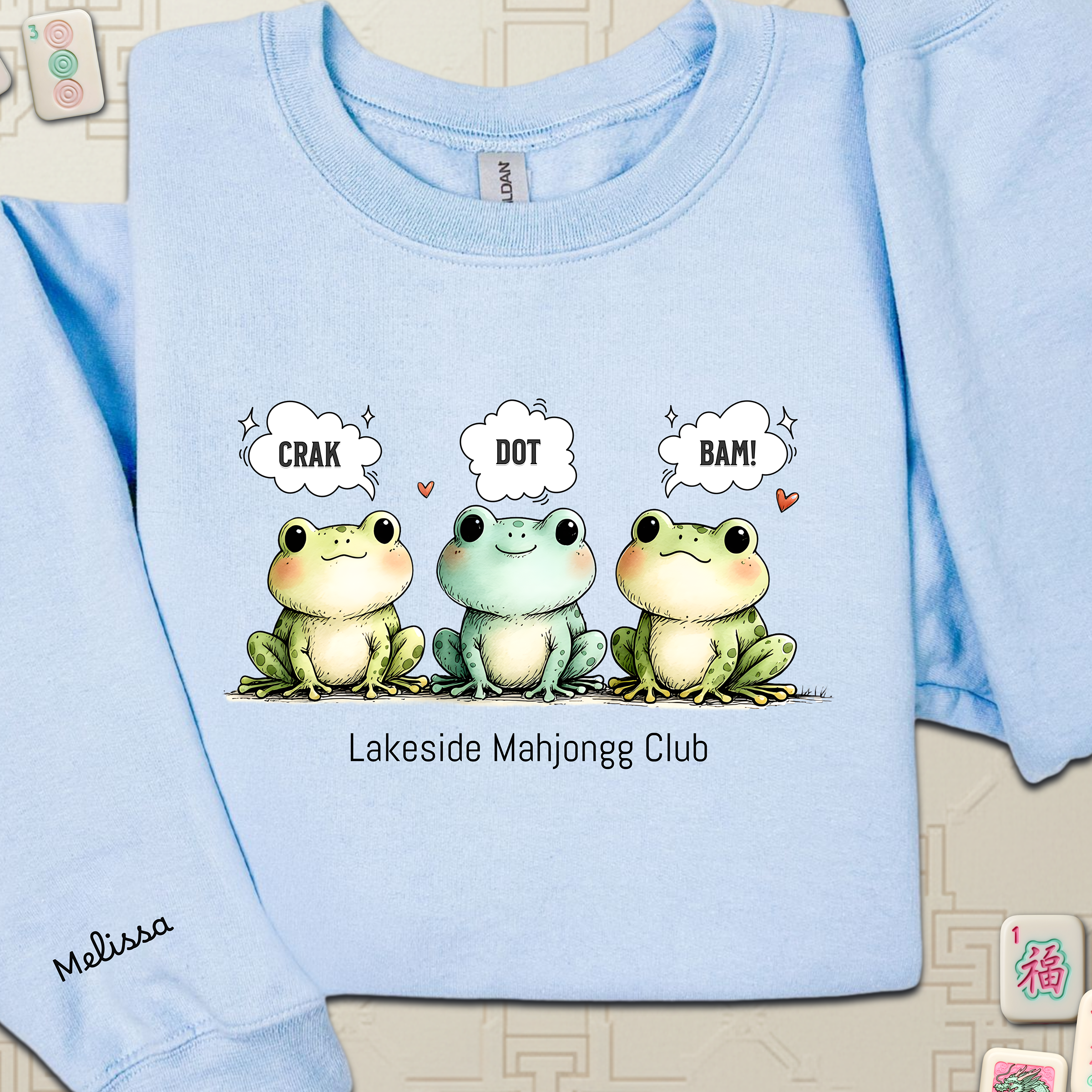 Froggy Crak Dot Bam Sweatshirt – Custom American Mahjong Club Pullover with Personalized Name on Chest and Sleeve, Unisex Heavy Blend™ Crewneck Gildan 18000Sweatshirt product thumbnail image Froggy Crak Dot Bam Sweatshirt – Custom American Mahjong Club Pullover with Personalized Name on Chest and Sleeve, Unisex Heavy Blend™ Crewneck Gildan 18000Sweatshirt product thumbnail image