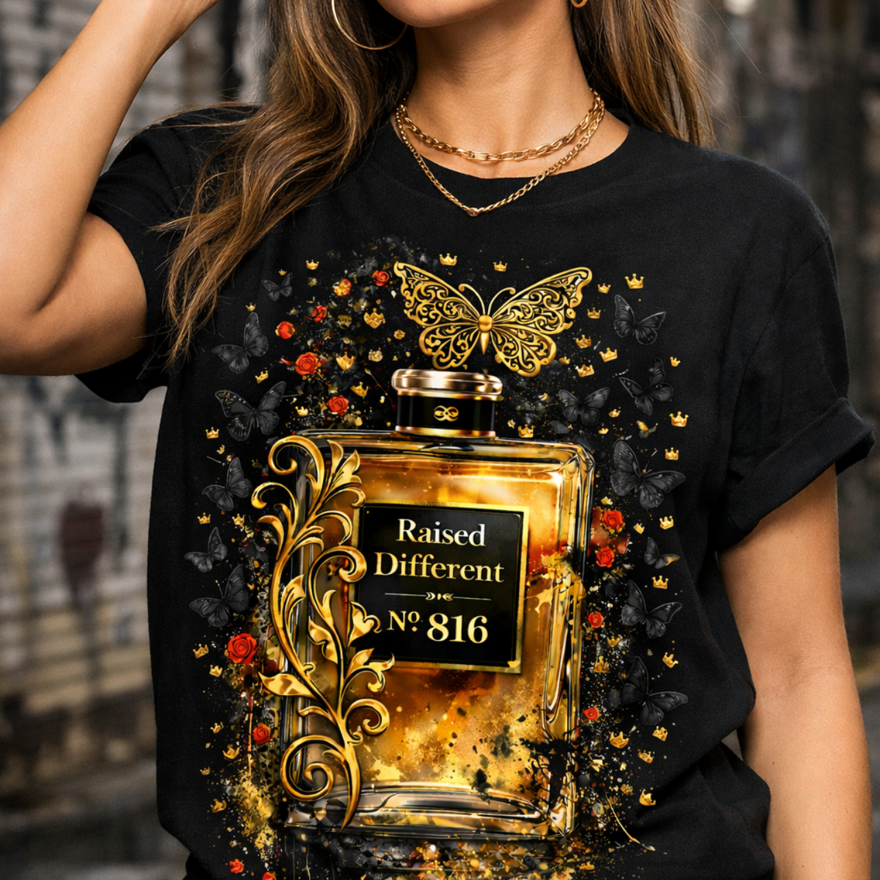 "Raised Different" Decorative Gold Perfume Bottle Tee — Butterfly Graphic T-Shirt product thumbnail image "Raised Different" Decorative Gold Perfume Bottle Tee — Butterfly Graphic T-Shirt product thumbnail image