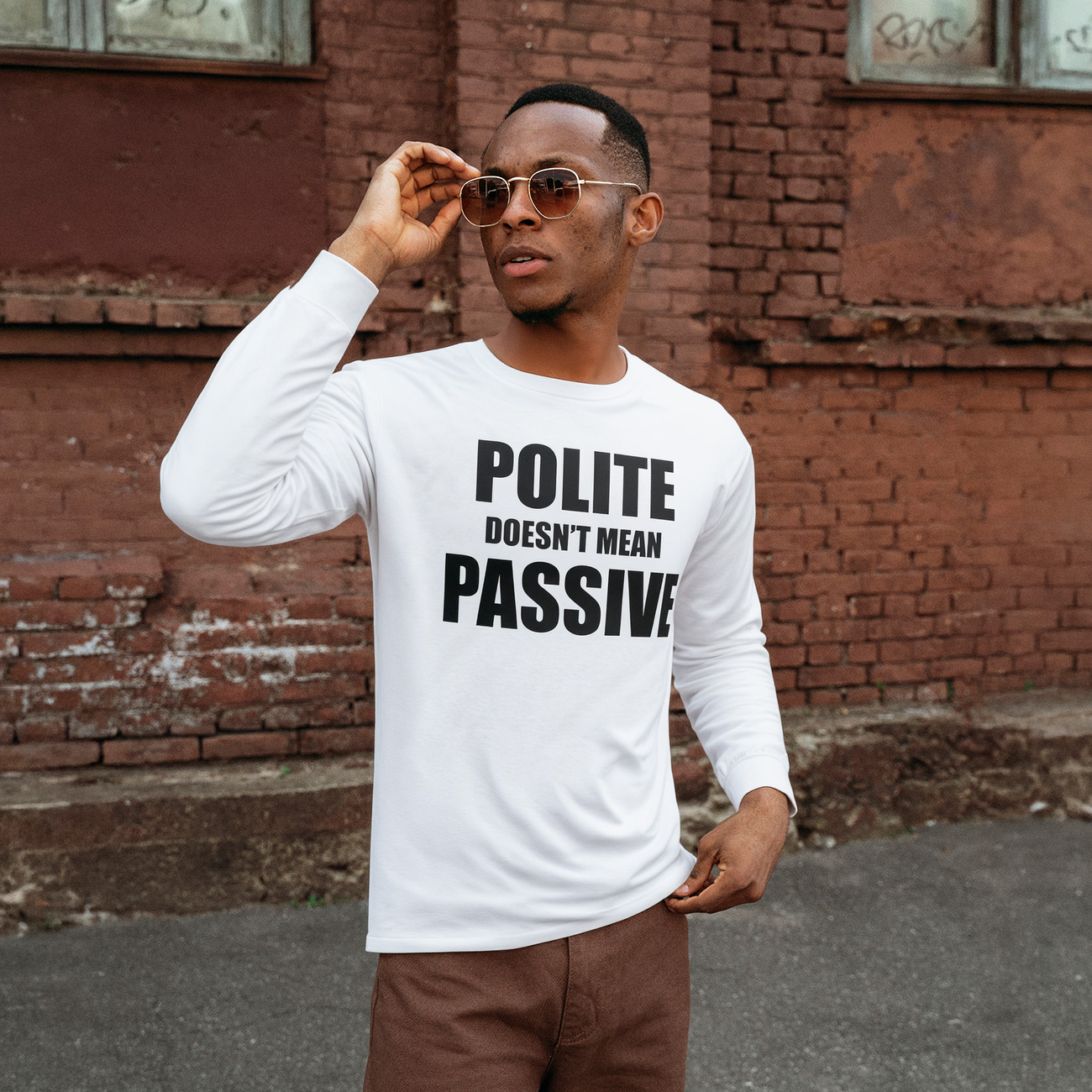 Long Sleeve Tee — "Polite Doesn't Mean Passive" Bold Statement Shirt