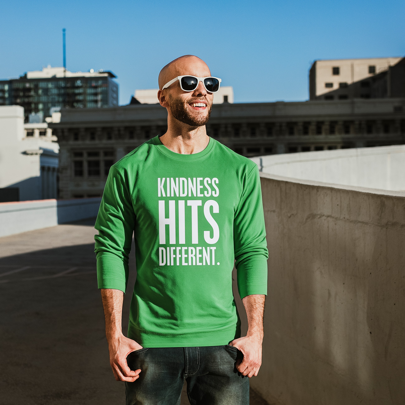 Kindness Hits Different Long Sleeve Tee product thumbnail image Kindness Hits Different Long Sleeve Tee product thumbnail image