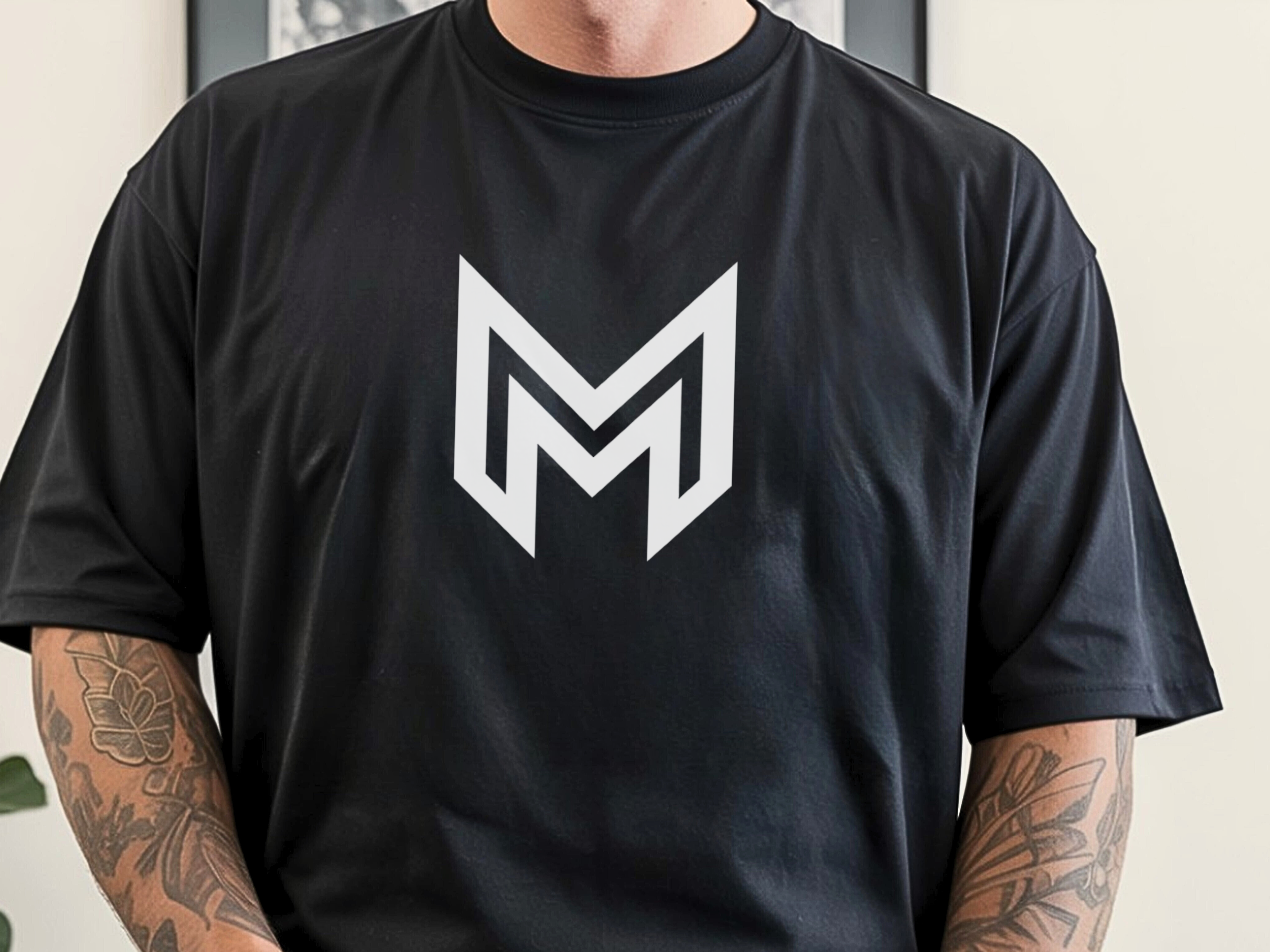 Black Tee with White "M" Logo