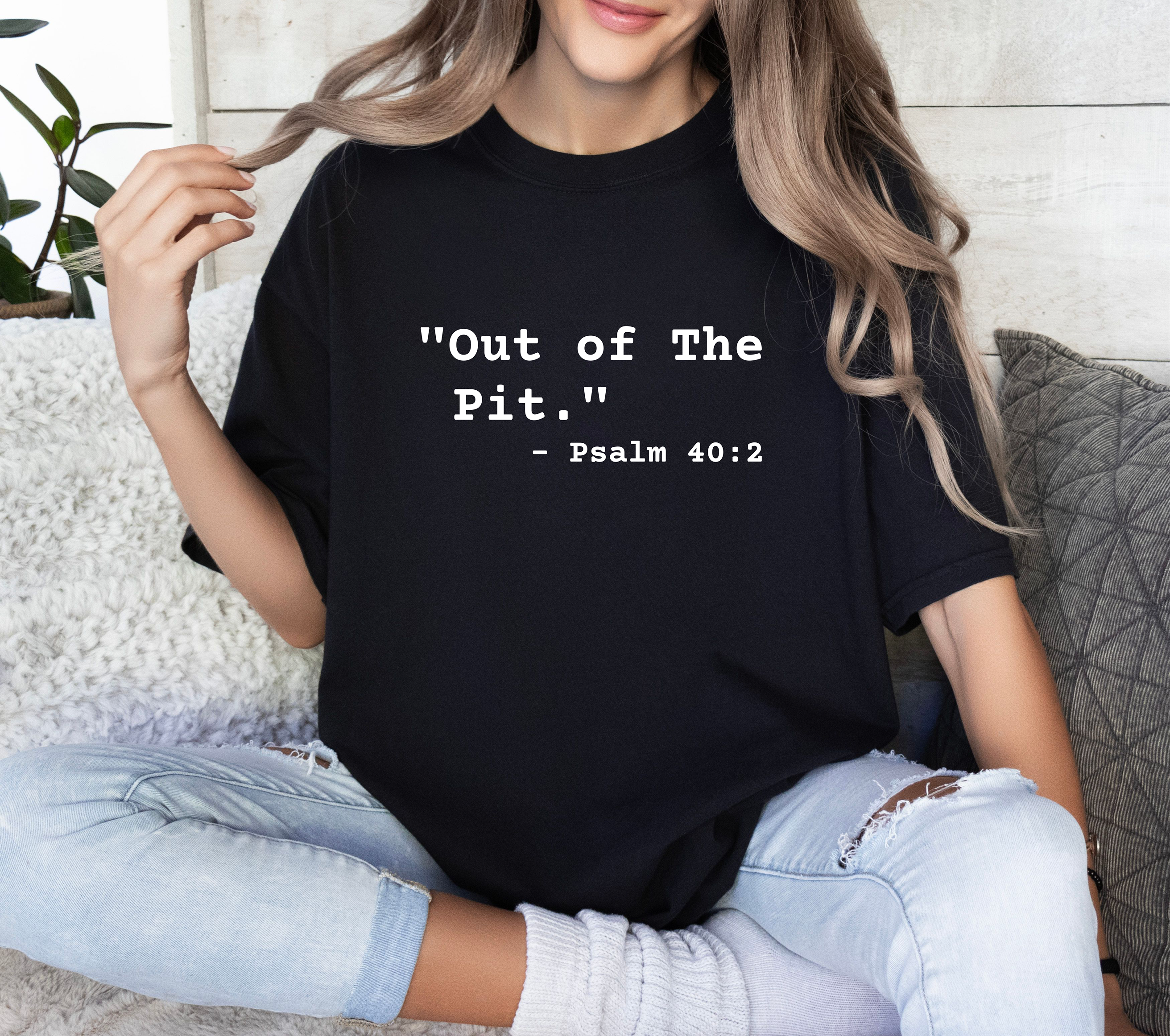Christian T-Shirt — "Out of The Pit." Psalm 40:2 Faith Tee product thumbnail image Christian T-Shirt — "Out of The Pit." Psalm 40:2 Faith Tee product thumbnail image