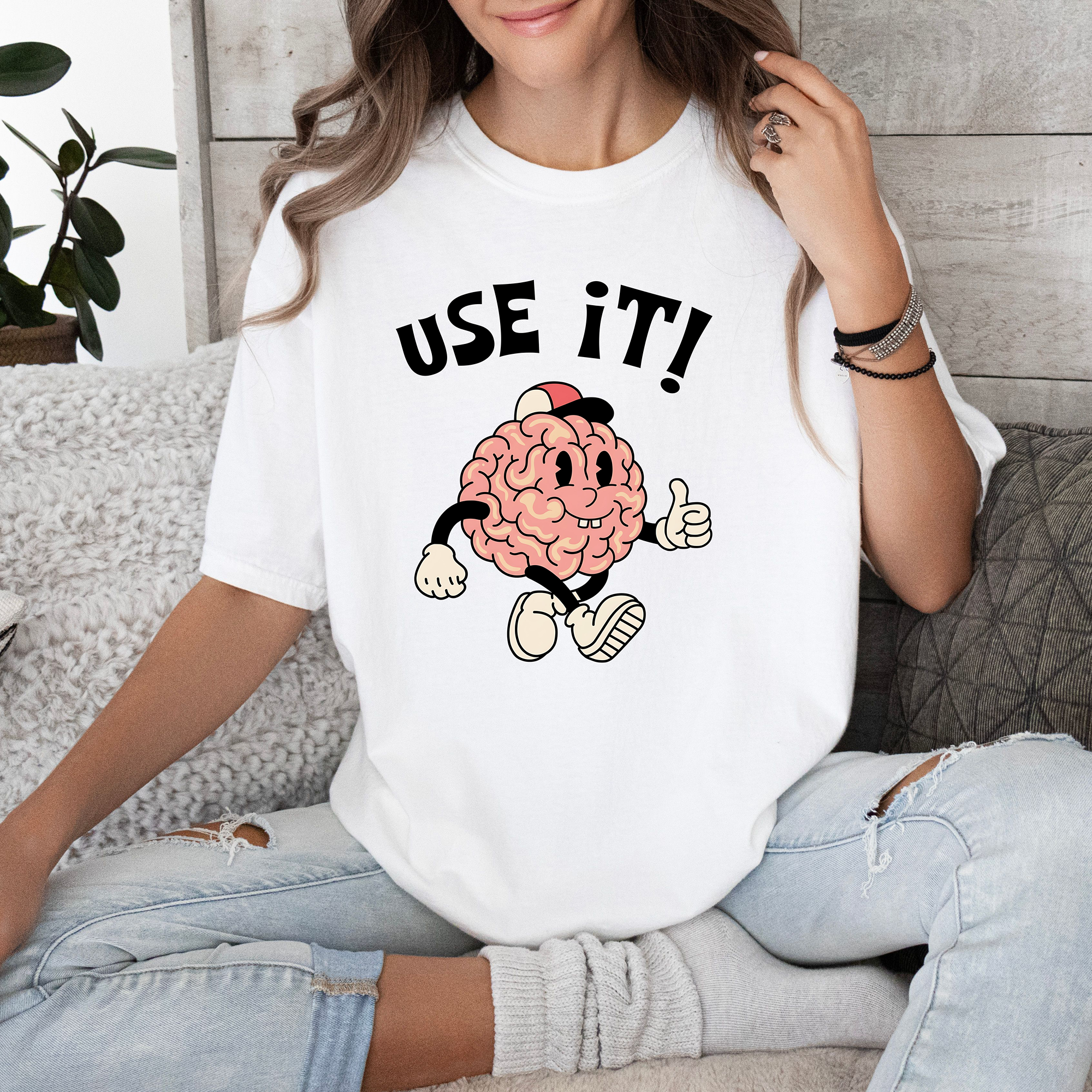 Use It! Brain Character T-Shirt — Retro Cartoon Mental Health Tee product thumbnail image