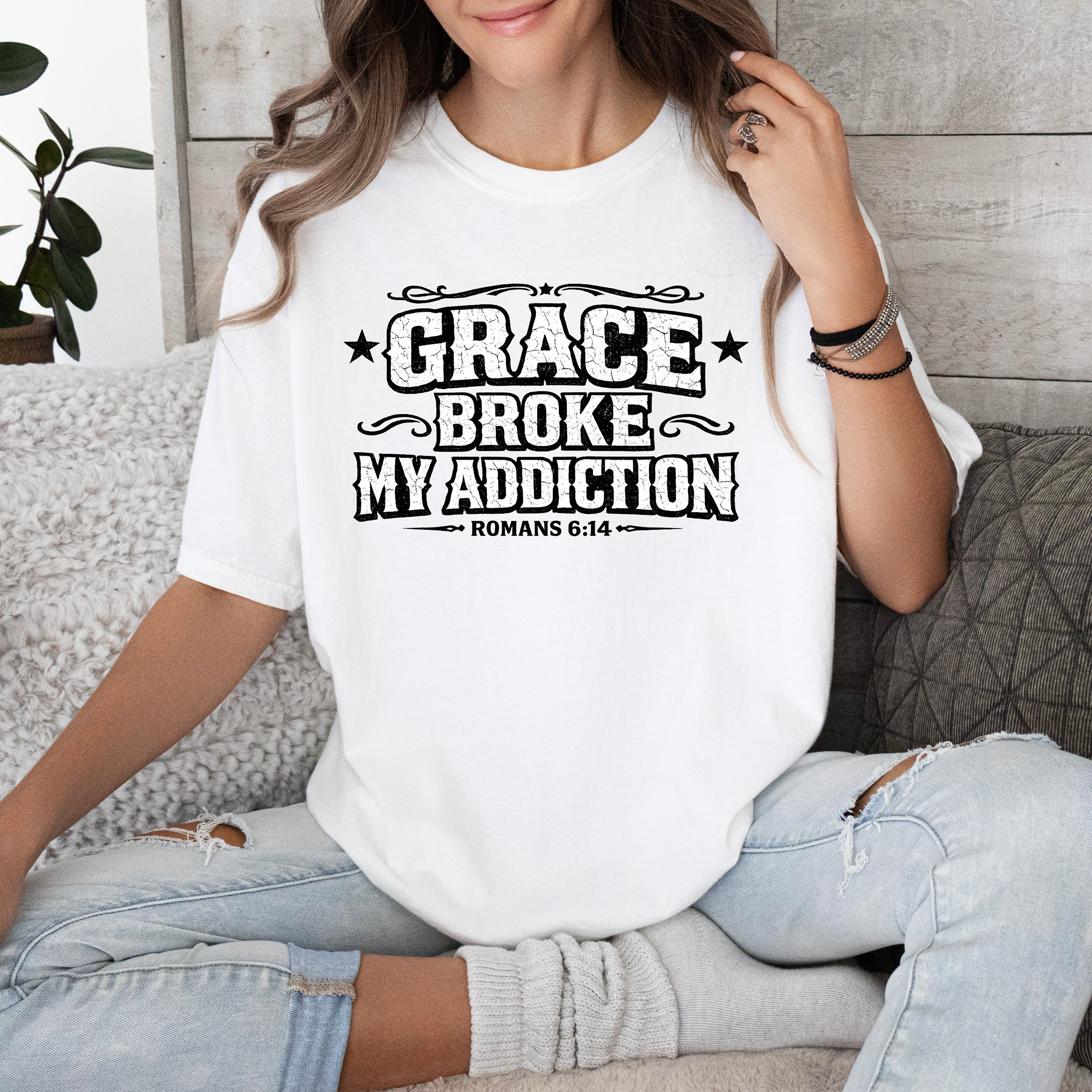 Grace Broke My Addiction T-shirt — Christian Faith Scripture Tee (Romans 6:14) product thumbnail image Grace Broke My Addiction T-shirt — Christian Faith Scripture Tee (Romans 6:14) product thumbnail image