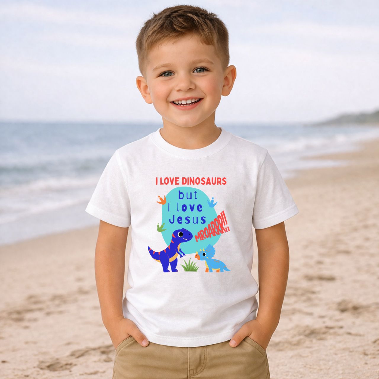 'Jesus Over Dinosaurs' Short Sleeve Toddler Tee product thumbnail image 'Jesus Over Dinosaurs' Short Sleeve Toddler Tee product thumbnail image