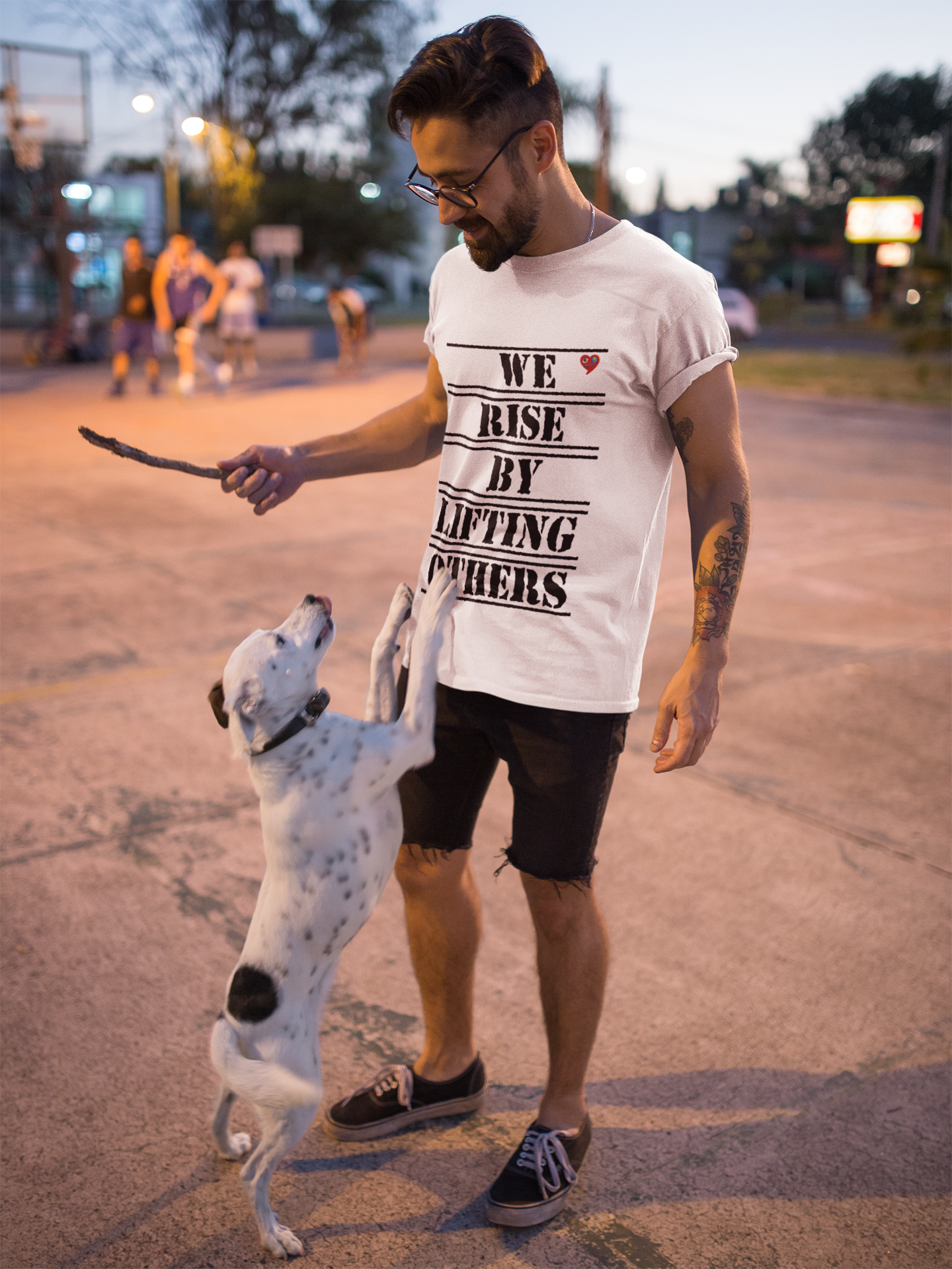 We Rise By Lifting Others T-Shirt – Inspirational Quote Tee with Small Heart product thumbnail image