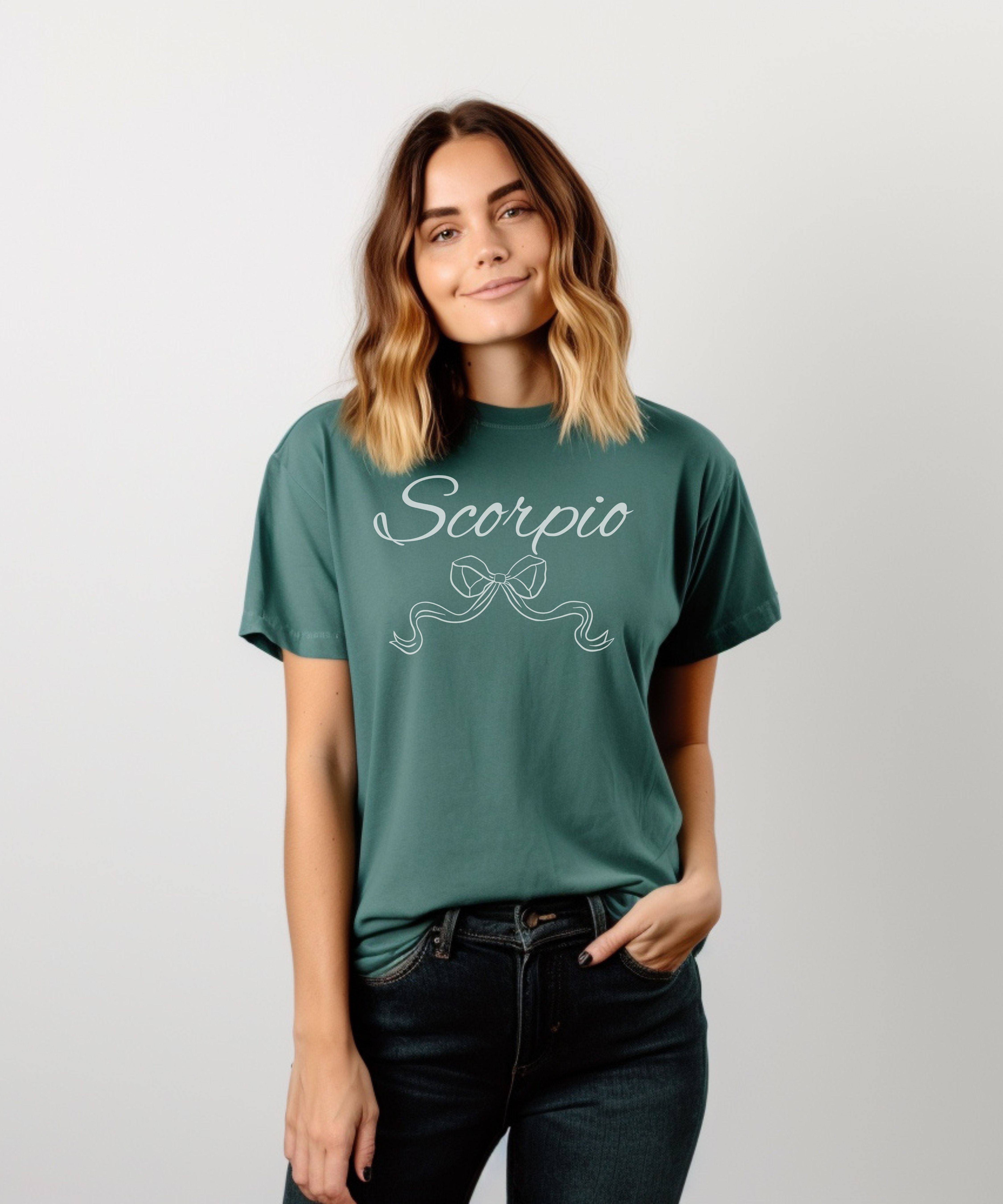 Scorpio Zodiac T-Shirt Script Astrology Tee with Decorative Ribbon product thumbnail image Scorpio Zodiac T-Shirt Script Astrology Tee with Decorative Ribbon product thumbnail image